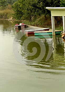 Tourist boating house in the lake at sittanavasal cave temple complex.