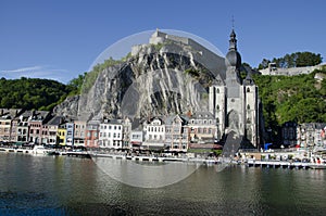 Tourist boats cruising along the River Meuse with the Notre Dame and Citadel behind, Dinant, Namur, Belgium