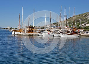 Tourist boats in harbor Omis