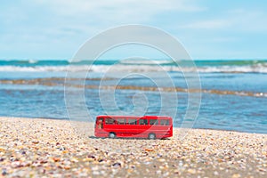 Tourist bus on the sea shore. Summer vacation on resort