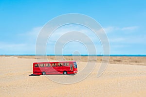 Tourist bus on the sea shore. Summer vacation theme
