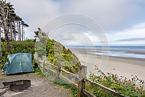 Tourist camp with a tent on the shore of the Pacific Ocean, California United States