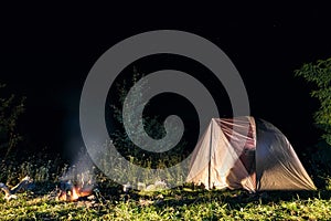 Tourist camping tent at night