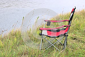 Tourist chair in park near the river