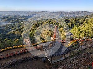 Tourist charm Puncak Songgo Langit, Mangunan, Yogyakarta during sunrise photo