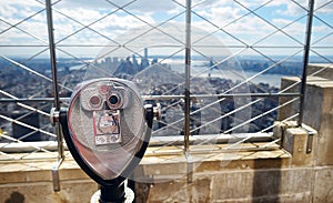 Tourist coin operated binoculars at the top of the Empire State Building in New York City