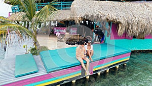 Tourist couple enjoying the caribbean sea