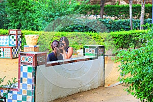 Tourist couple enjoying a visit to Seville