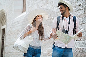 Tourist couple exploring city