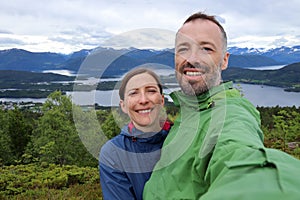 Tourist couple in Sunnmore, Norway