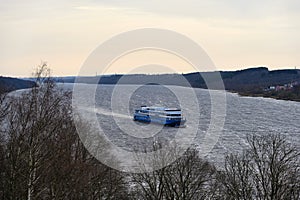 Tourist cruise ship sails along the Volga River