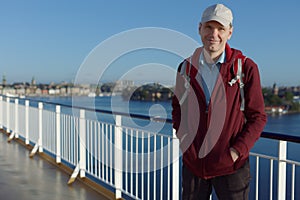 Tourist on a deck of cruise ship