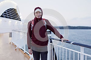 Tourist on a deck of cruise ship