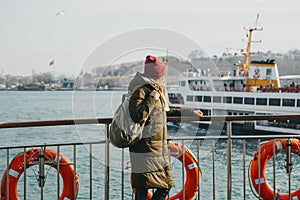 Tourist on deck on a ferry