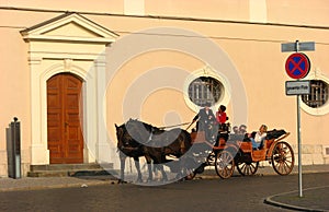 Tourist enjoying the horse carriage ride at Weimar