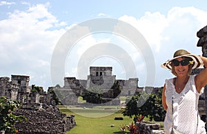 A Tourist Enjoys the Mayan Ruins of Tulum in Mexico