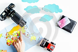 Tourist equipment with map and camera for traveling with kids on