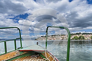 Tourist fishing boat ride pov with view of beautiful Ohrid old town, Macedonia