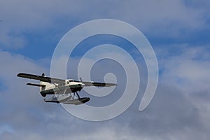 Tourist float plane prepares to land on the Tongass Narrows