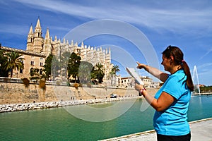 tourist in front of Majorca Palma Cathedral at Balearic Islan