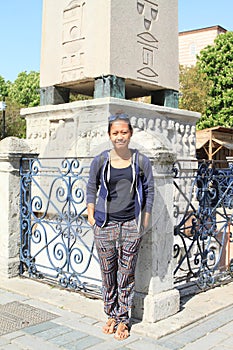 Tourist in front of Obelisk of Theodosius