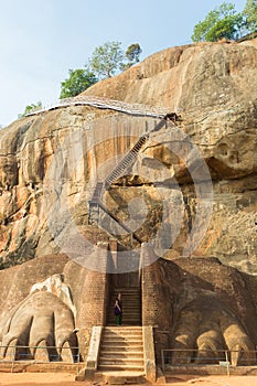 Tourist at the gate to Sigiriya rock summit