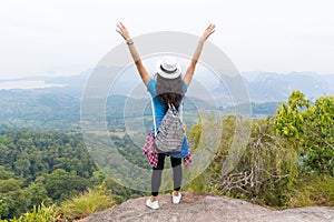 Tourist Girl With Backpack Standing On Mountain Top Raised Hands Back Rear View Enjoy Beautiful Landscape