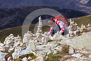 Tourist girl at the Dolomites