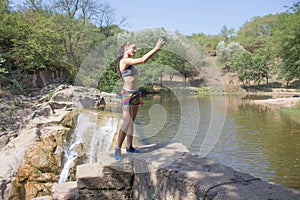 Tourist girl, lifestyle, nature and adventure concept. traveler girl holding smartphone and shooting himself, recording video repo