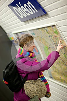 Tourist girl in Parisian metro