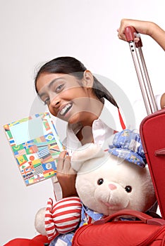 Tourist girl reading a traveler book