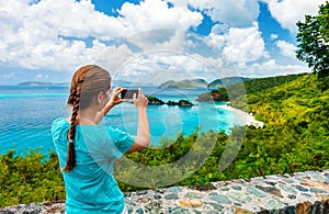 Tourist girl at Trunk bay on St John island