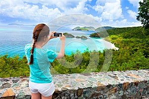 Tourist girl at Trunk bay on St John island