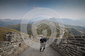 Tourist in Great Wall, China