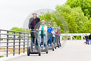 Tourist group driving Segway at sightseeing tour