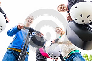 Tourist group having guided Segway tour