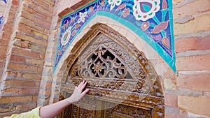 Tourist in Gur Emir Mausoleum in Samarkand