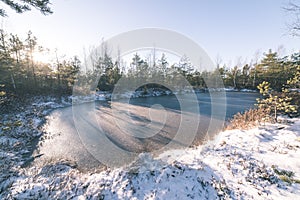 tourist hiking trail in woods in winter - vintage film effect