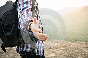 Tourist hold helping hand