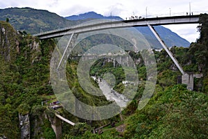 Tourist jumping from a bridge in BaÃÂ±os, Ecuador photo