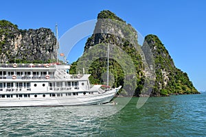 Tourist Junks in Halong Bay,Panoramic view of a day in Halong Bay, Vietnam, Southeast Asia photo