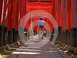 Tourist in Kyoto-Inari gates tunnel