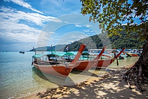 Tourist long tail boat on the beach at Surin island,.
