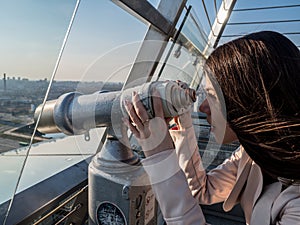 Tourist look observant binoculars telescope on panoramic view