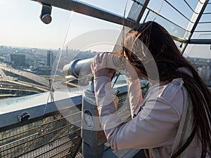 Tourist look observant binoculars telescope on panoramic view