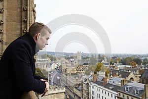 Tourist Looking Out Over View Of Oxford Skyline