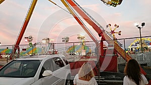 Tourist looking at ride on Palace Playland