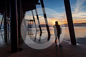 Tourist looking sunset at Pismo beach, California