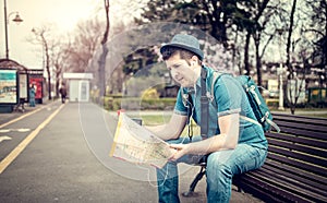 Tourist lost in a city checking maps and calling a friend - Unfriendly tourist infrastructure destinations