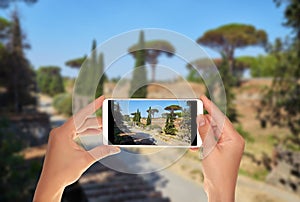 Tourist makes a photo of ruins in Pompeii